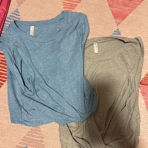 Two Free people Movement Sleeveless Cropped Workout tops